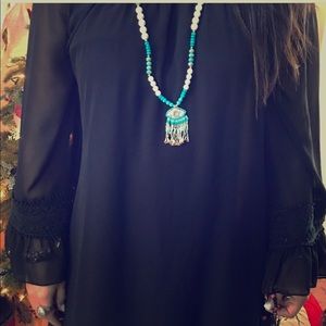 White and blue beaded eye necklace